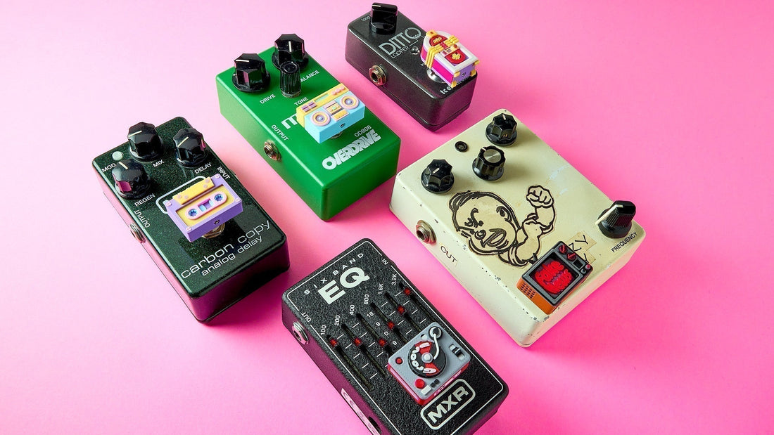  Mr.MojoFX Vintage Tech guitar pedal switch toppers installed on an effects pedalboard
