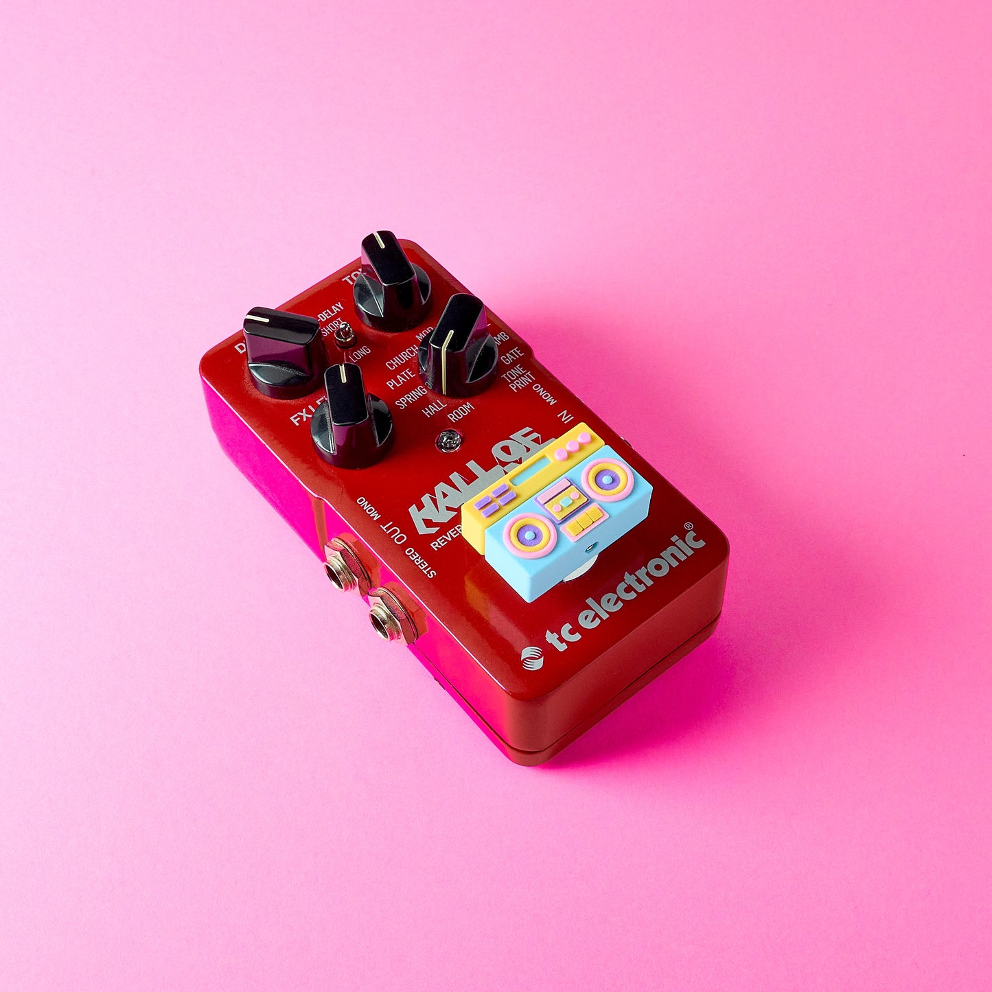 Boombox Topper mounted on TC Electronic reverb guitar effects pedal footswitch using screw fit system for standard 10mm switches