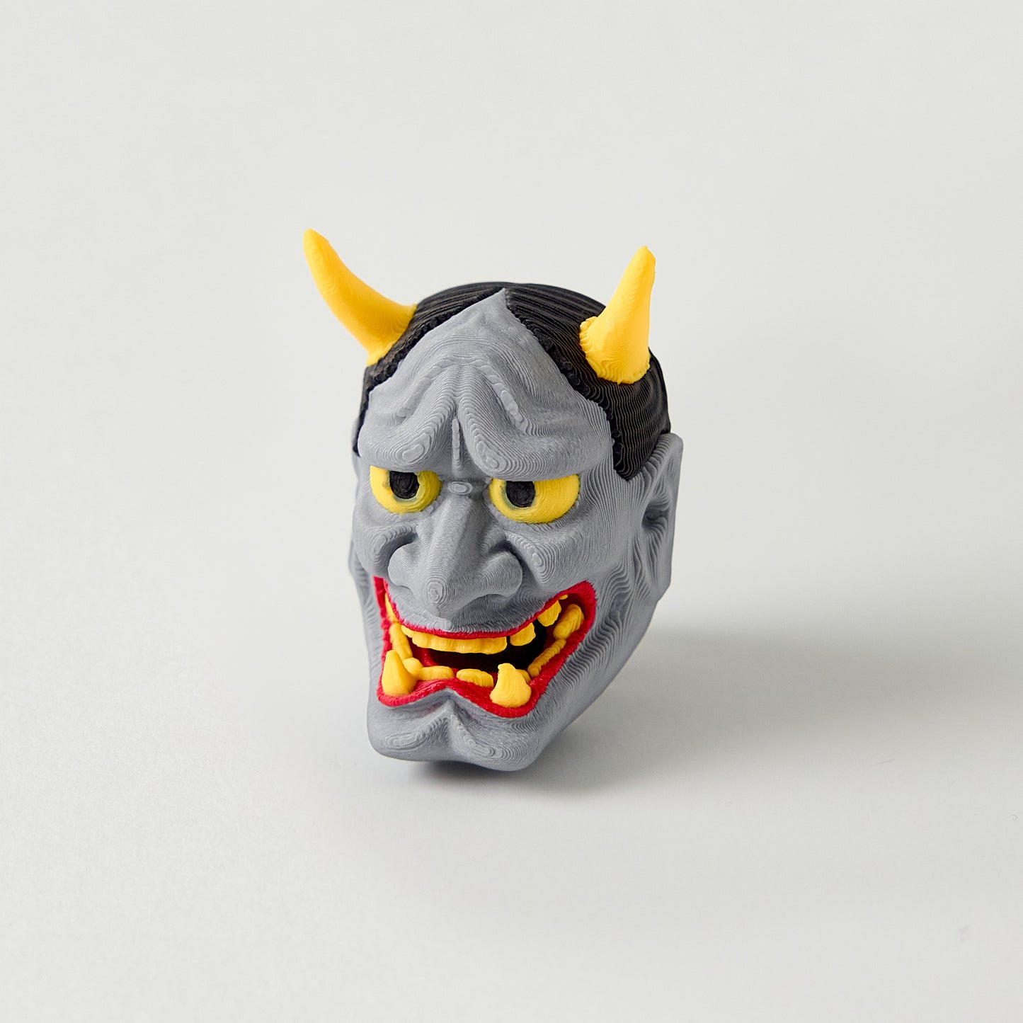 Hannya Topper — Japanese demon mask design with horns effects pedal switch topper front view for 10mm guitar and bass footswitch
