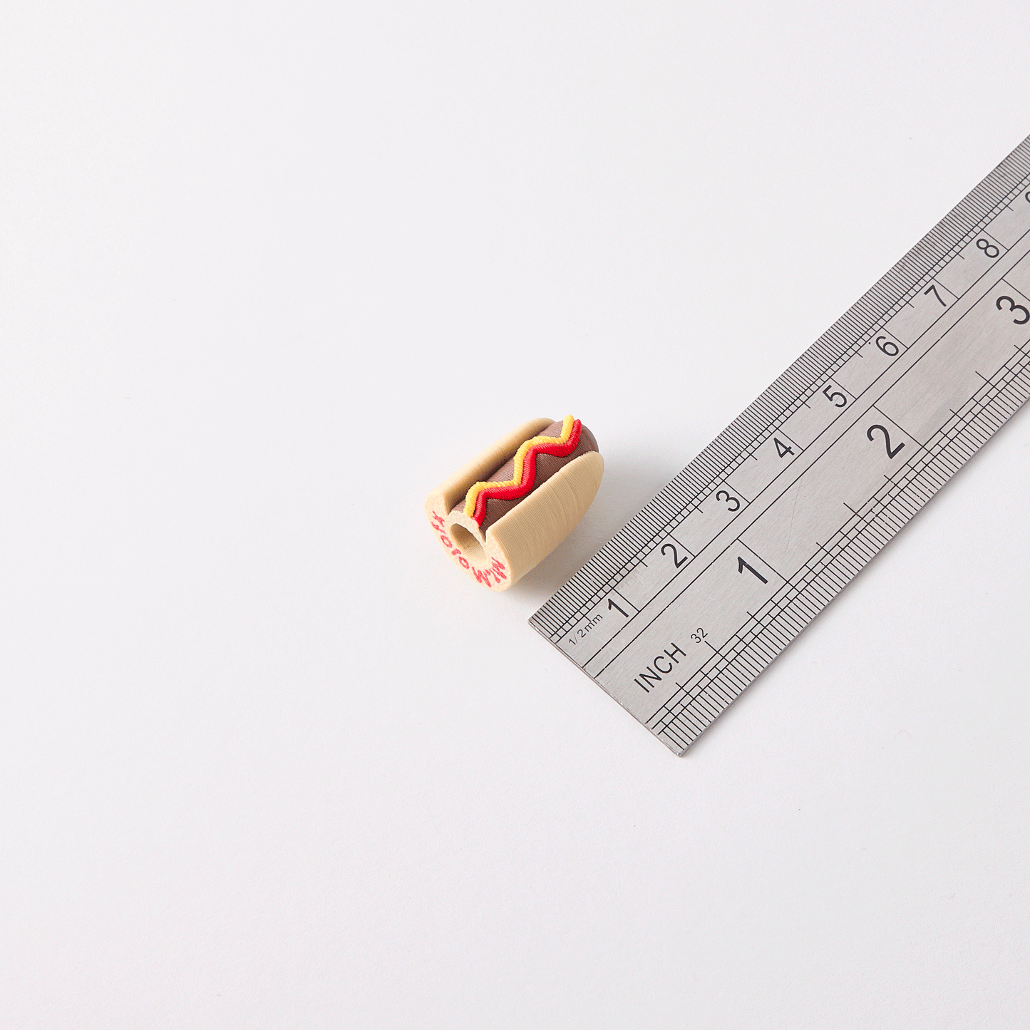 Hot Dog Knob Cap — ruler size reference showing Munchies custom hot dog DJ knob cap dimensions
