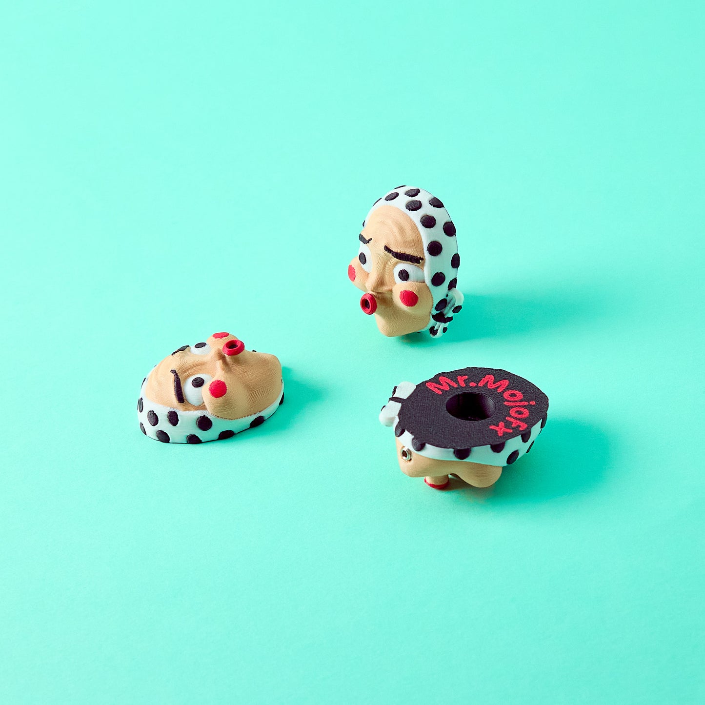 Hyottoko Topper with Donut Topper — Mr.MojoFx Masks and Munchies collection pedal switch toppers on teal background