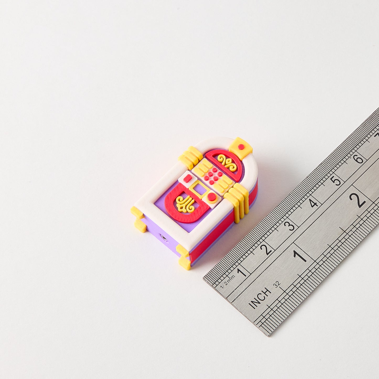 Jukebox Topper size reference with ruler showing small batch small batch hand finished retro jukebox guitar effects pedal footswitch accessory approximately 4cm tall