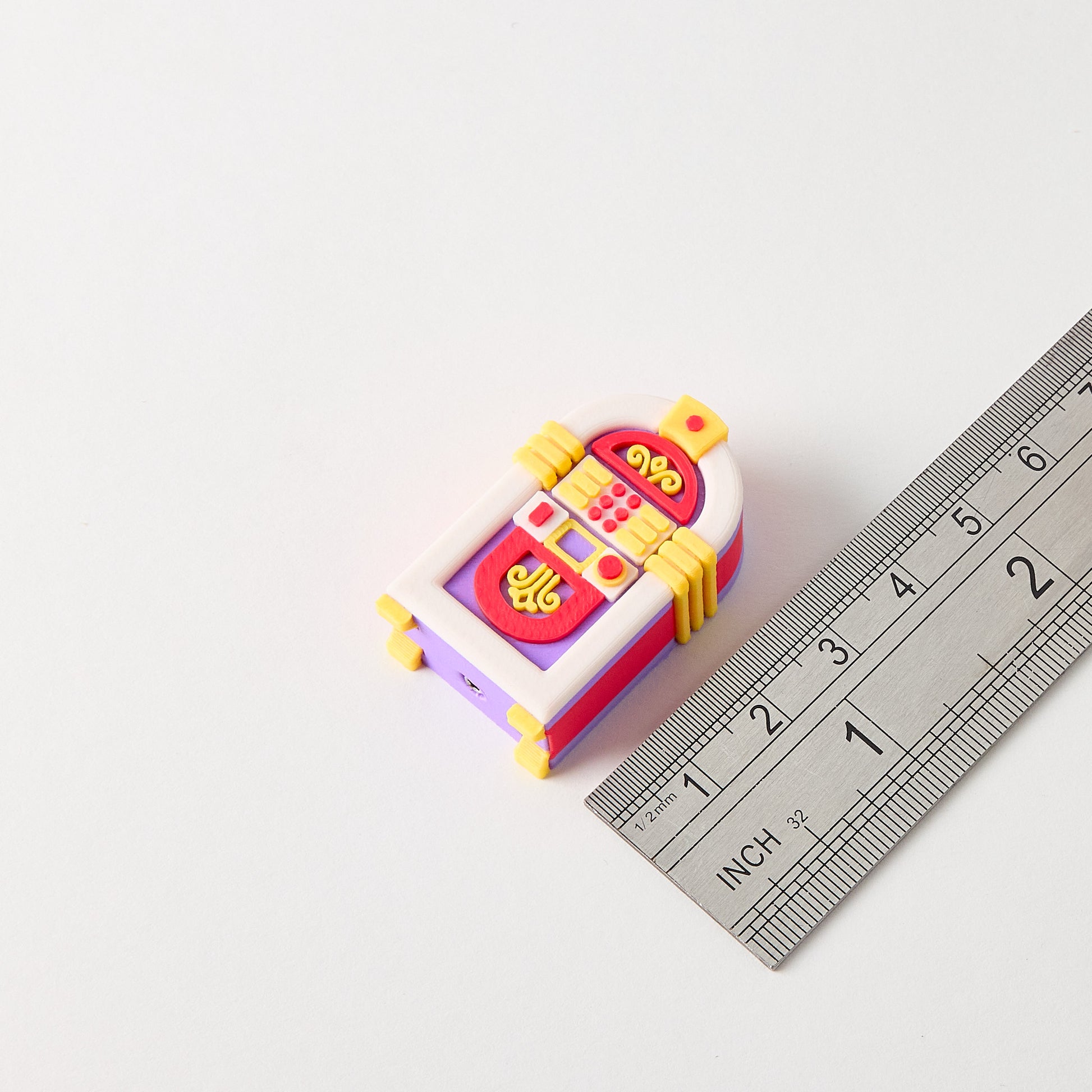 Jukebox Topper size reference with ruler showing small batch small batch hand finished retro jukebox guitar effects pedal footswitch accessory approximately 4cm tall