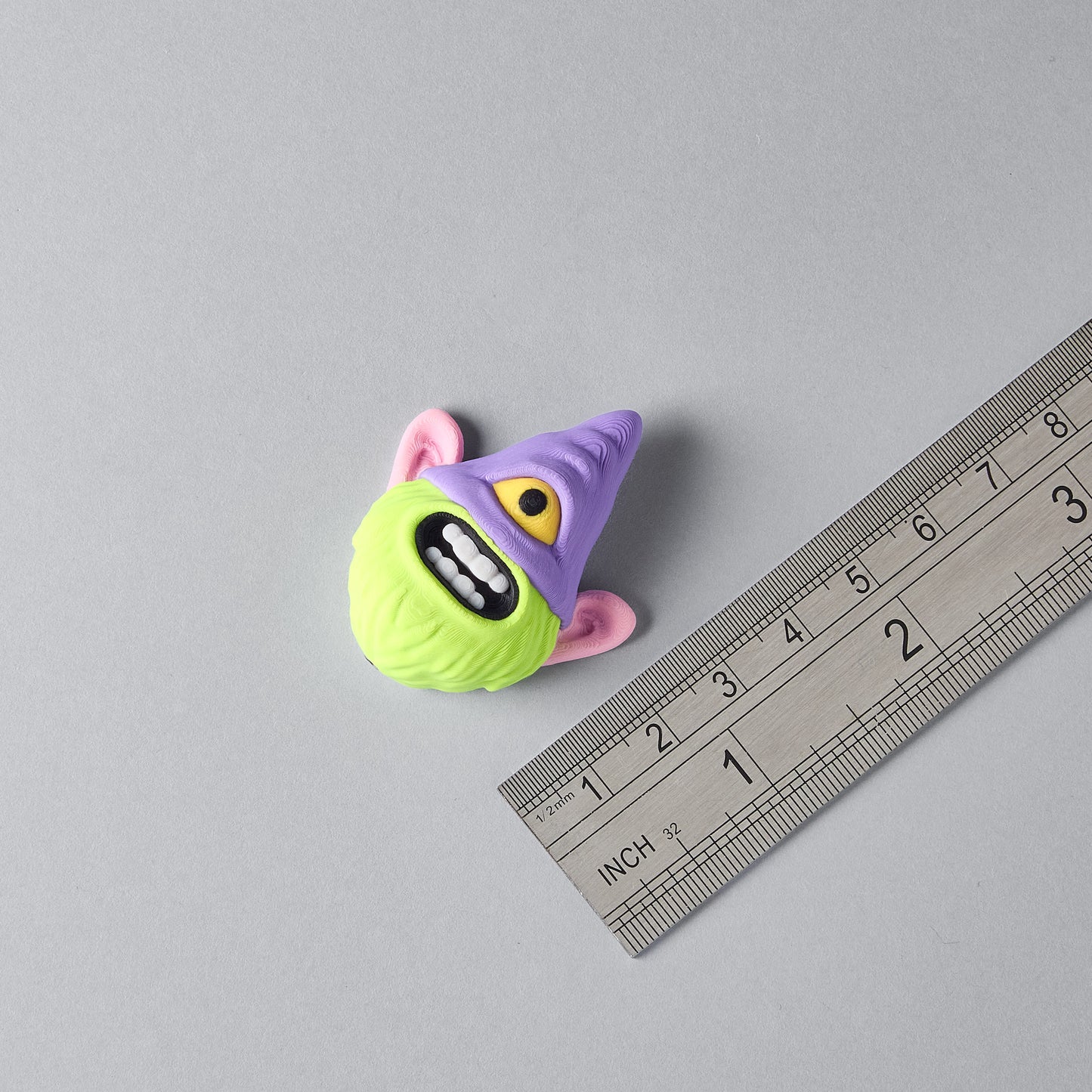 LURK gnome guitar pedal switch topper next to a ruler for size reference, Mr.MojoFx Artist Series