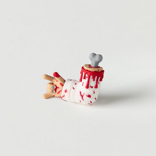 Mr. MojoFX Dogtown Broken Arm guitar pedal switch topper – white cast with blood drips, skeletal fingers and a bone protruding from the top

