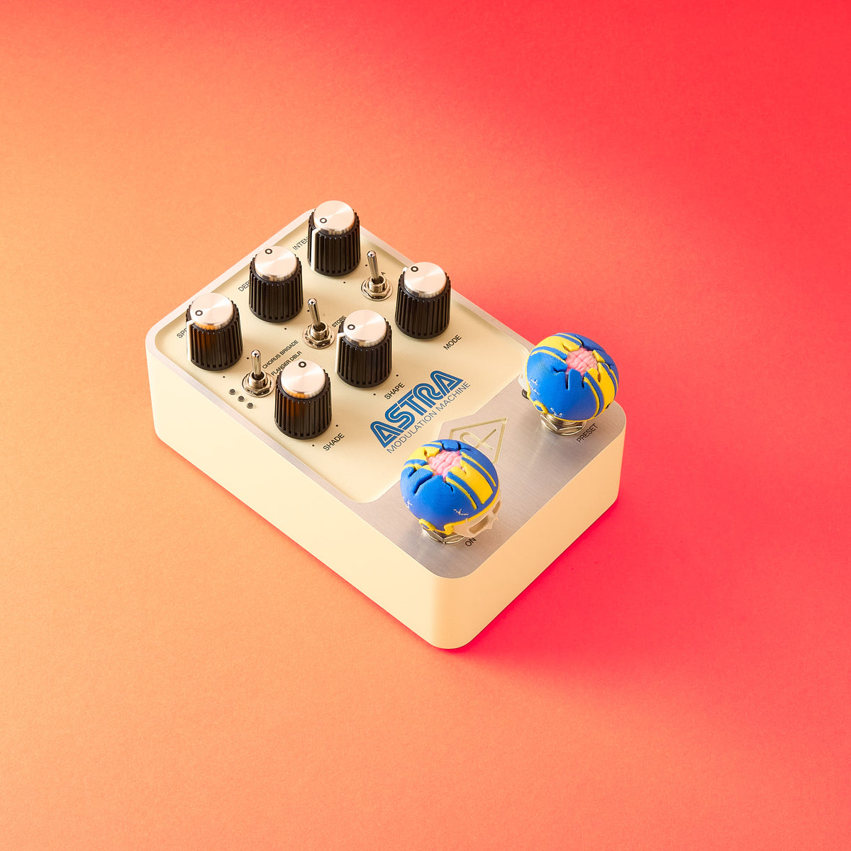 Mr.MojoFX Dogtown Skull Helmet switch topper installed on a cream Universal Audio ASTRA modulation machine guitar effects pedal – Dogtown Collection by Mr.MojoFX