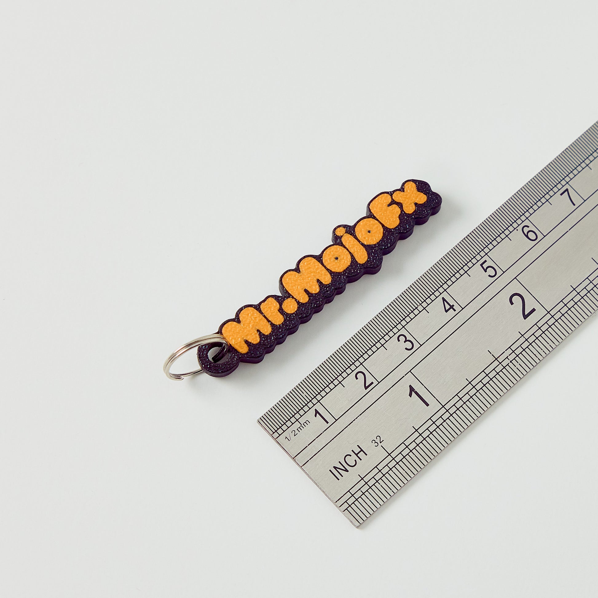 Mr.MojoFx mini key fob — size reference showing 60mm length