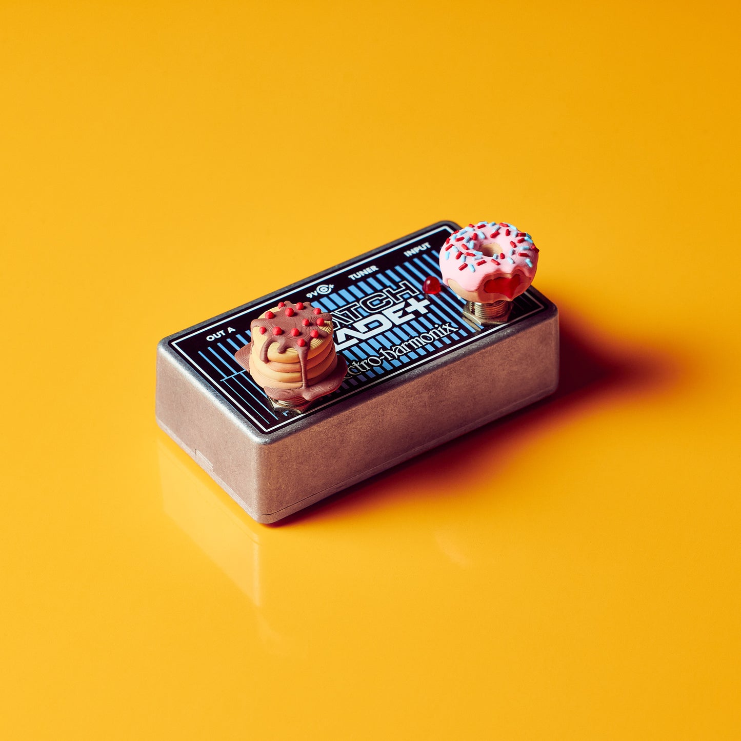 Pancake Topper footswitch cap with chocolate sauce and screw fit system, Electro Harmonix Blade+ pedal also styled with a Donut Topper on the secondary switch 
