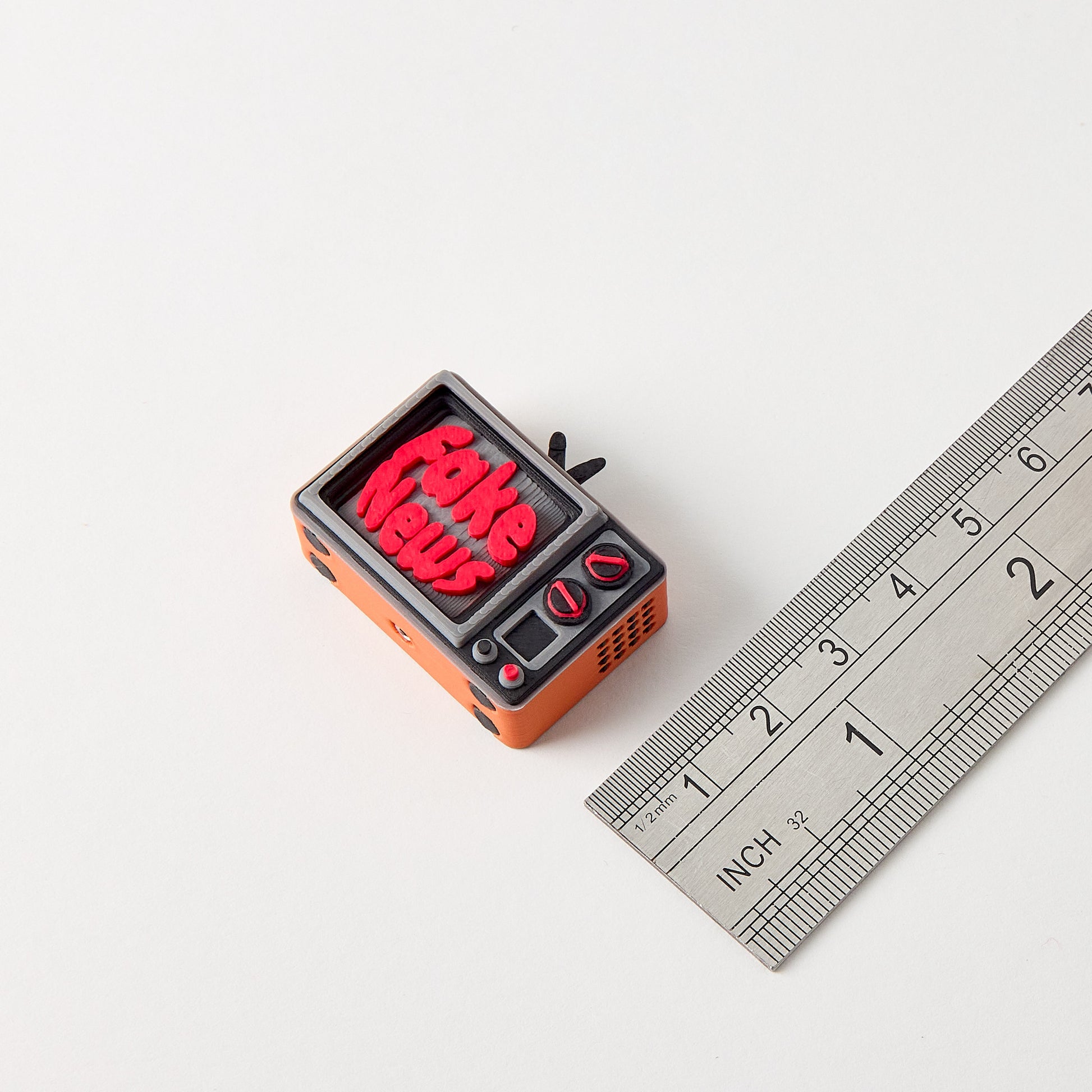 TV Topper size reference with ruler showing small batch hand finished guitar effects pedal footswitch
accessory approximately 3cm tall